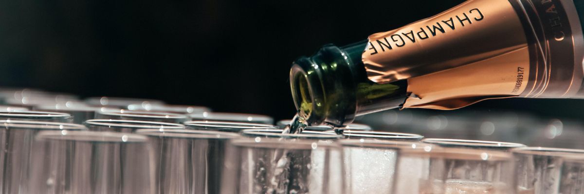 Champagne pouring on glass